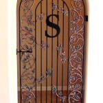 Wine Cellar Gate With Grape & Vine Border And S Initial
